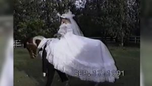 Bride posing with horse groom