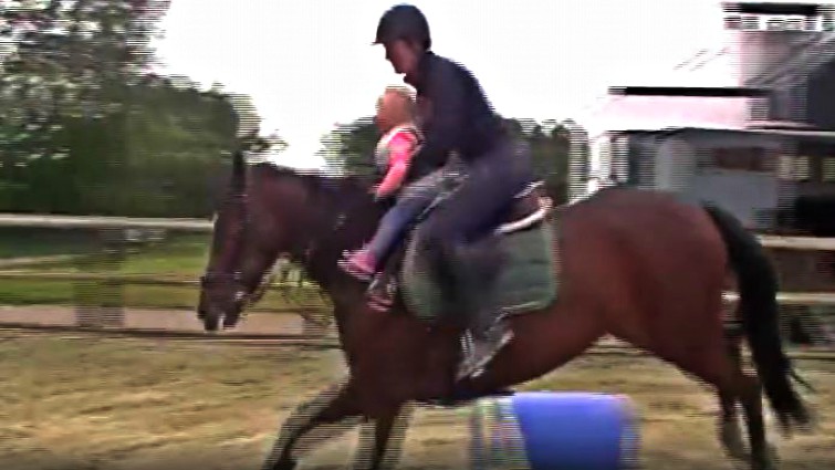 Young rider with strong equestrian skills