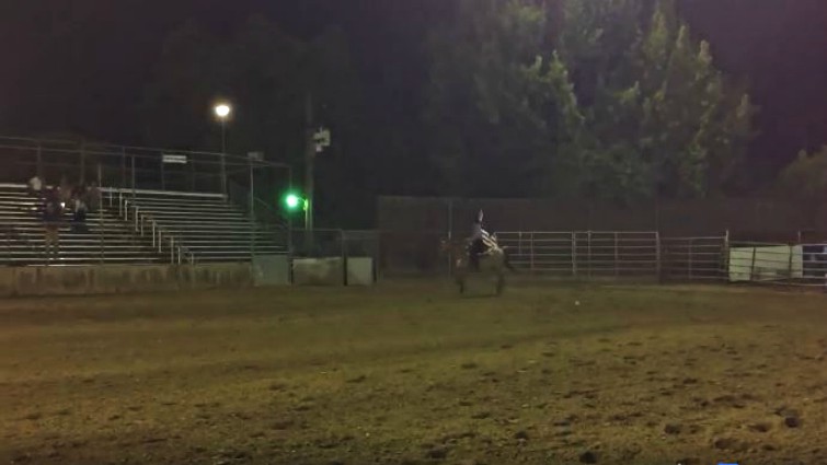 95-year-old Georgia Stepp trotting with American flag