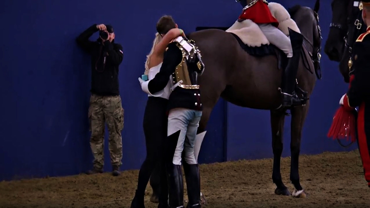 Newly engaged couple at horse show