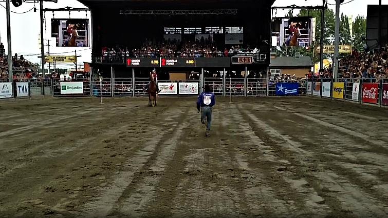 Riders performing the incredible horse swap stunt