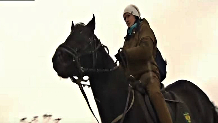 Maria delivering mail on her horse through scenic rural landscape