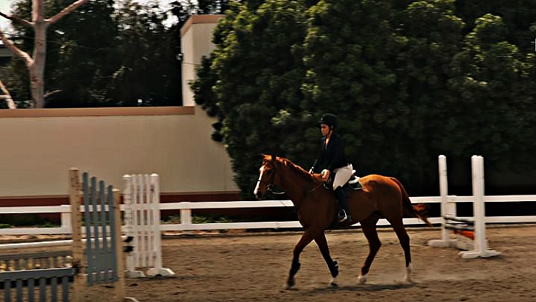 Youth learning to ride at Compton Jr. Posse